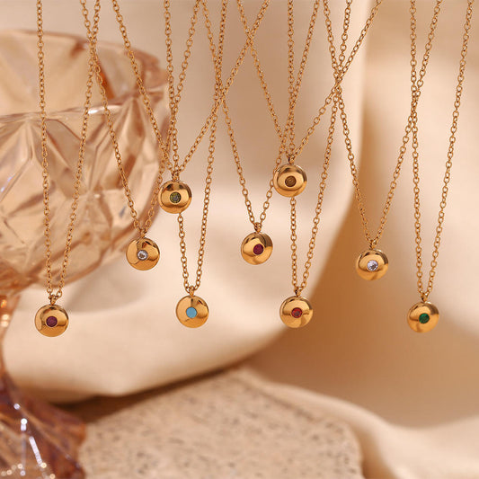 Collier médaille strass